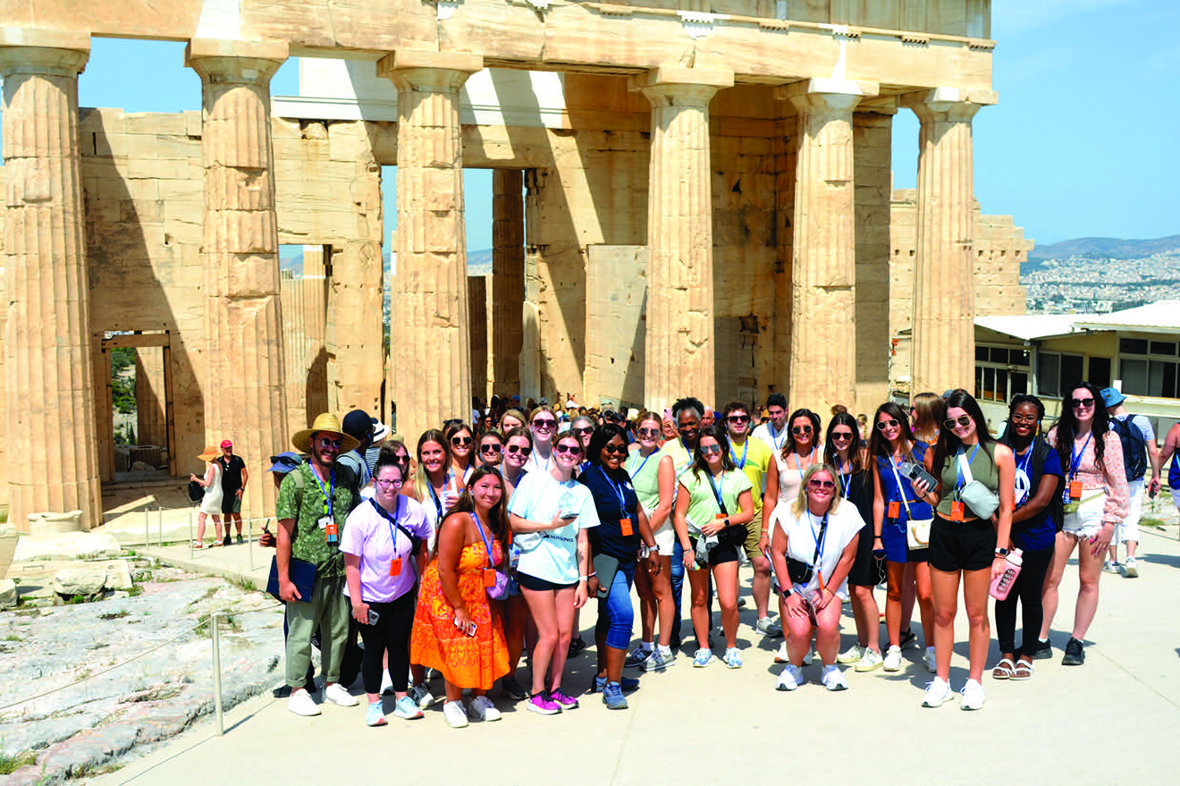 Greece Service-Learning Program participants in front of the Acropolis during a cultural excursion.
