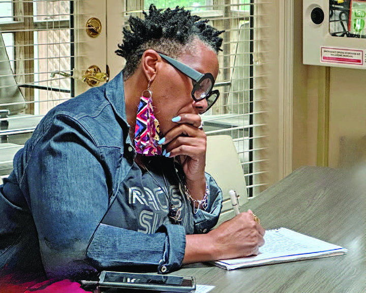 OLLI member engaged in writing project