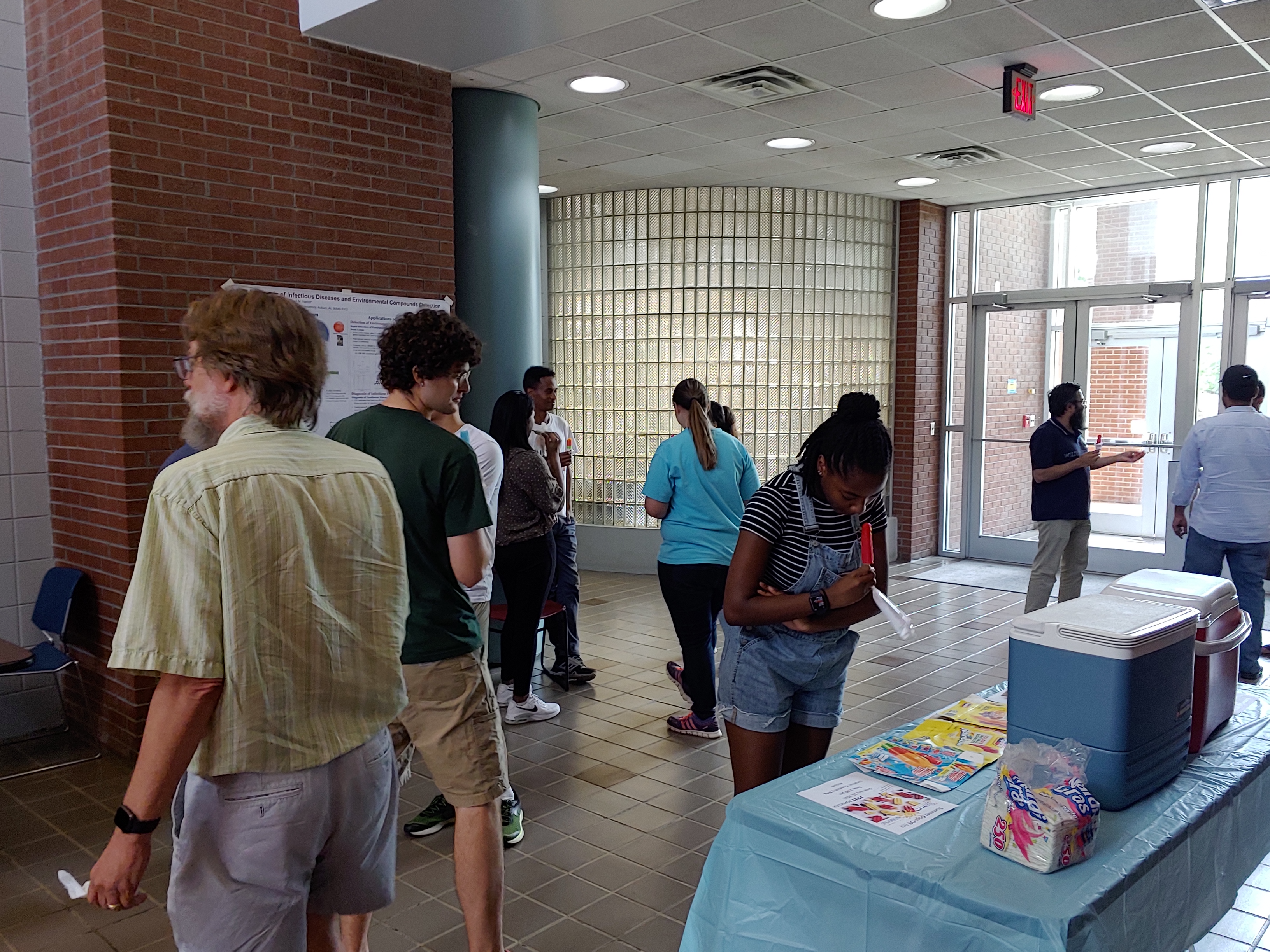 Photos of students gathering in the Department of Chemistry building.