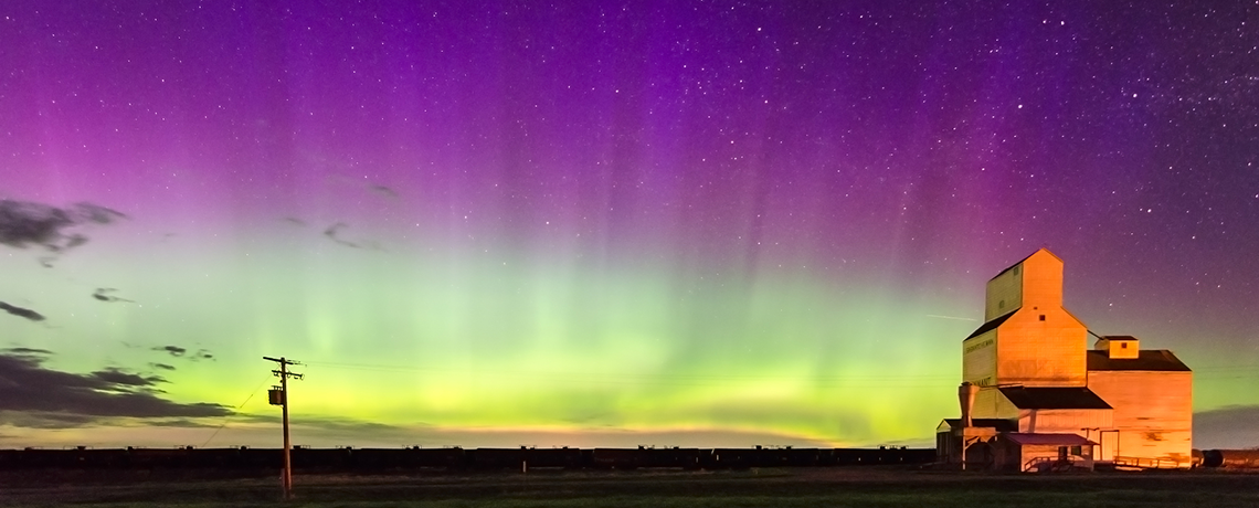 Aurora Borealis over a historic grain elevator in Pennant, Saskatchewan