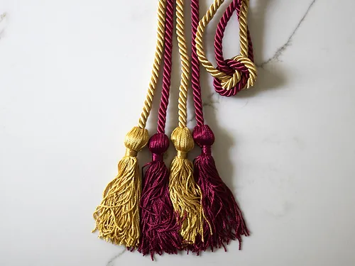 Rho Lambda red and gold cord