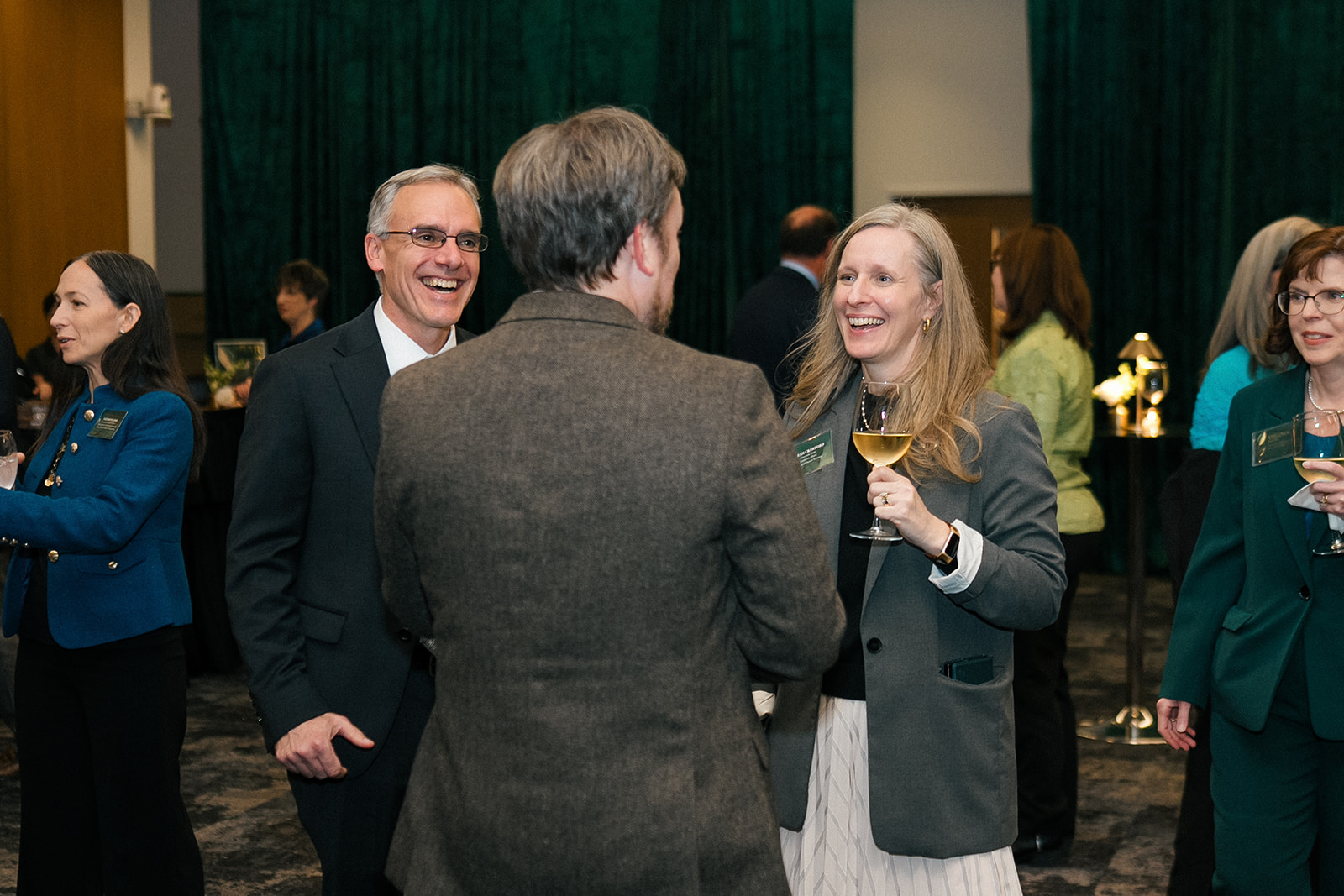 Faculty Awards 2025 attendees and honorees talking