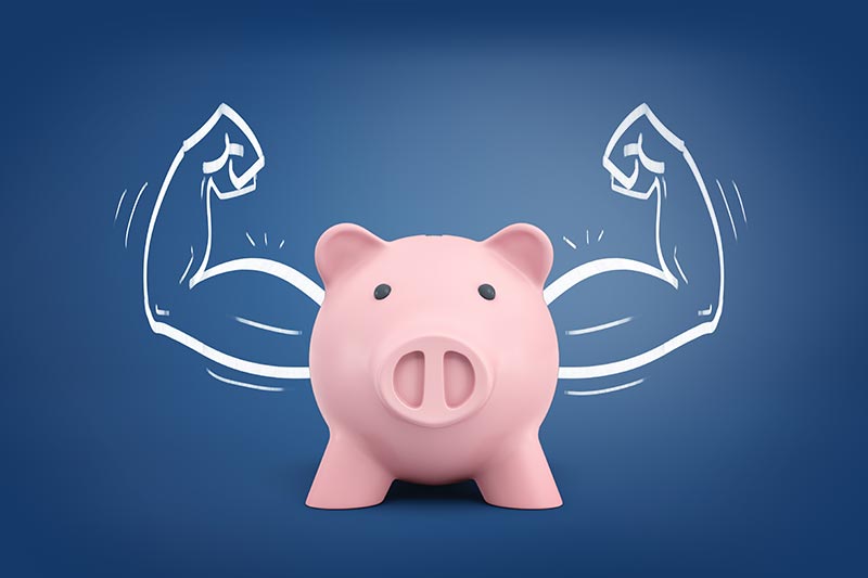 A piggy bank with muscles