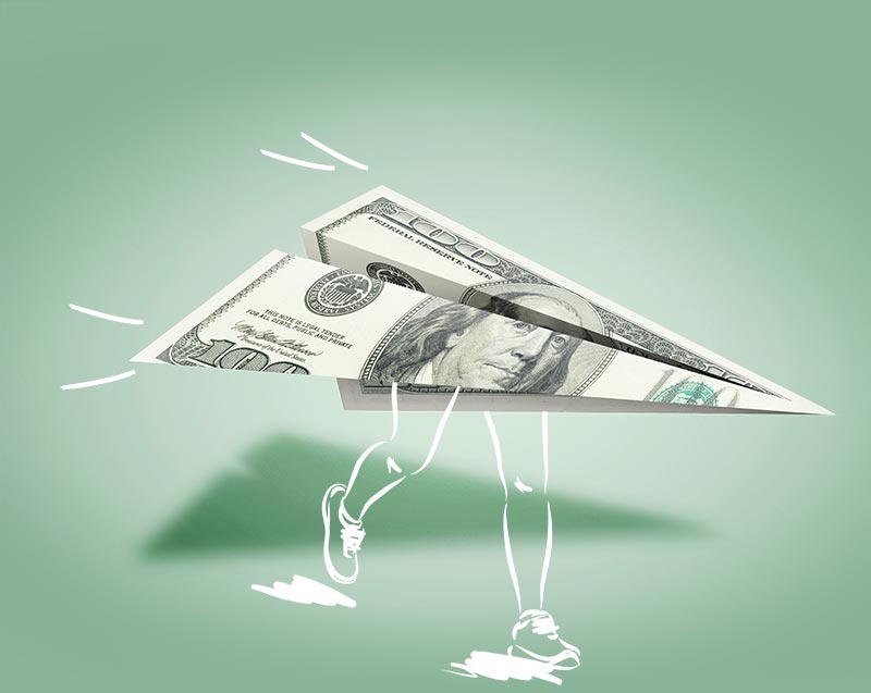 Money folded into a paper plane