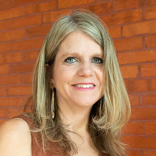 Headshot photo of Lora Merchant