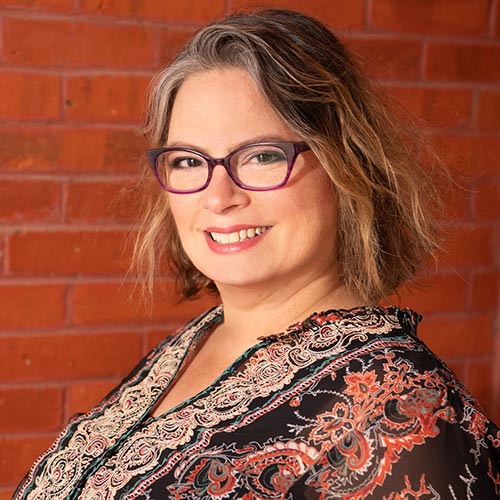 Headshot photo of J. Ashley Butler