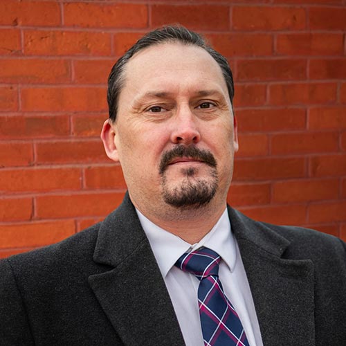 Headshot photo of Kenneth Crowell