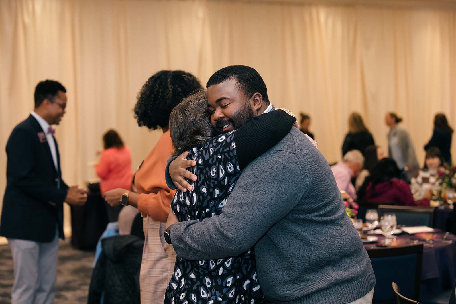 Provost Advising Awards 2026 attendees hugging