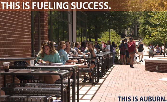 This Is Fueling Success. Students partaking in an outdoor meal image.