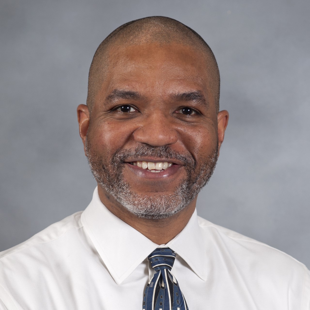 Dr. Eric Tate