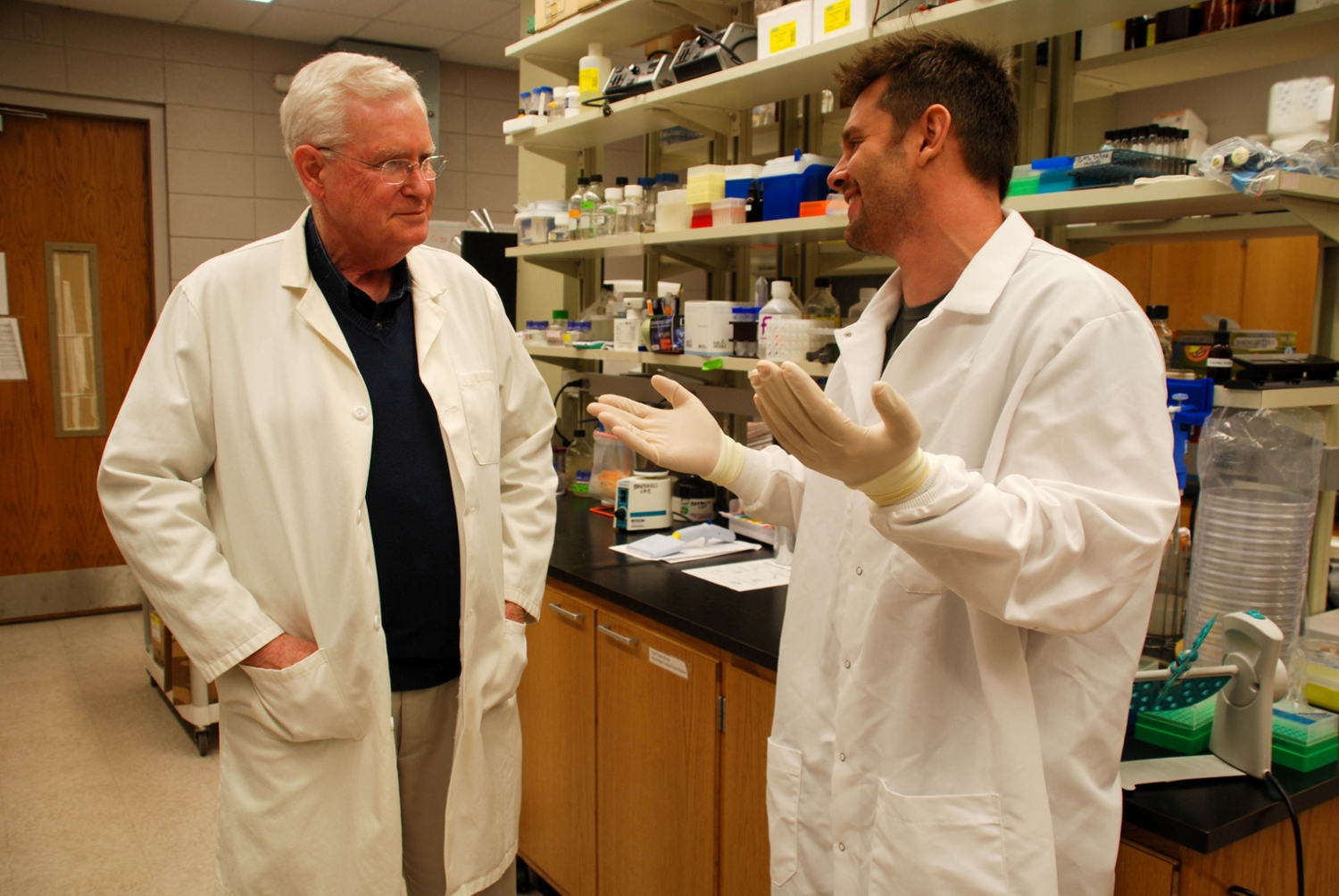 James Barbaree in the lab with a student