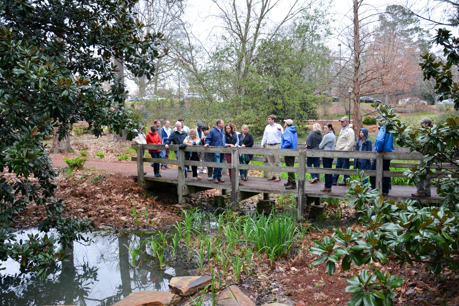 Visitors on the bridge in the Garden of Memory