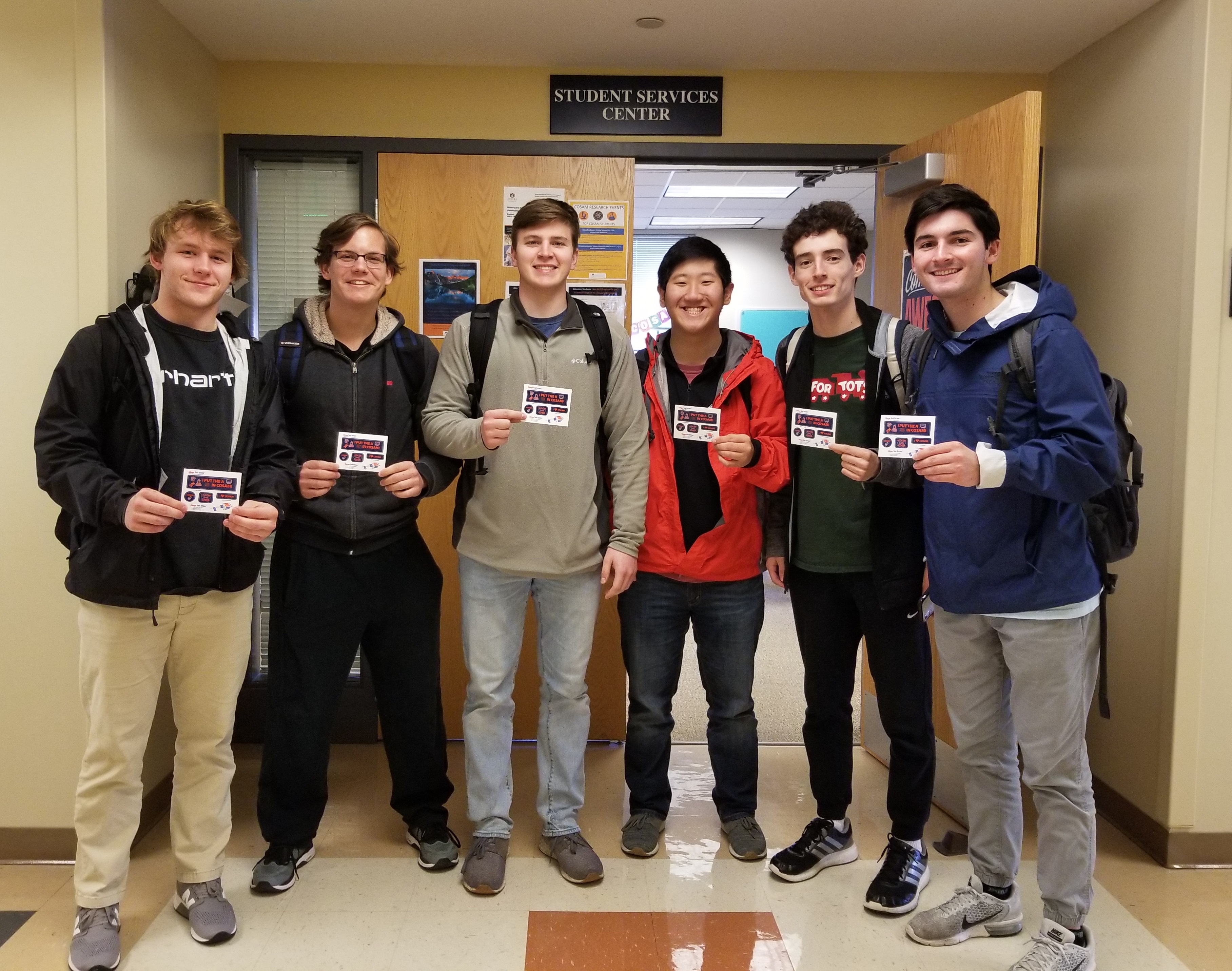 Students in front of the Office of Student Services.