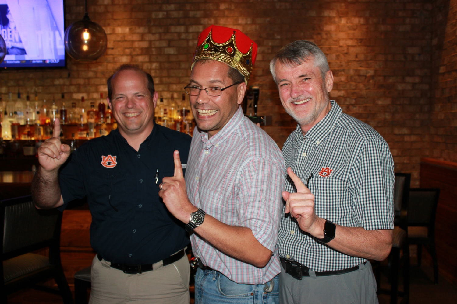 Robert Scott Miller, Scott Santos, and Robert Boyd celebrate Biological Sciences being crowned the winners of the COSAM Faculty and Staff Campaign during an appreciation luncheon. Not pictured is Leslie Goertzen.