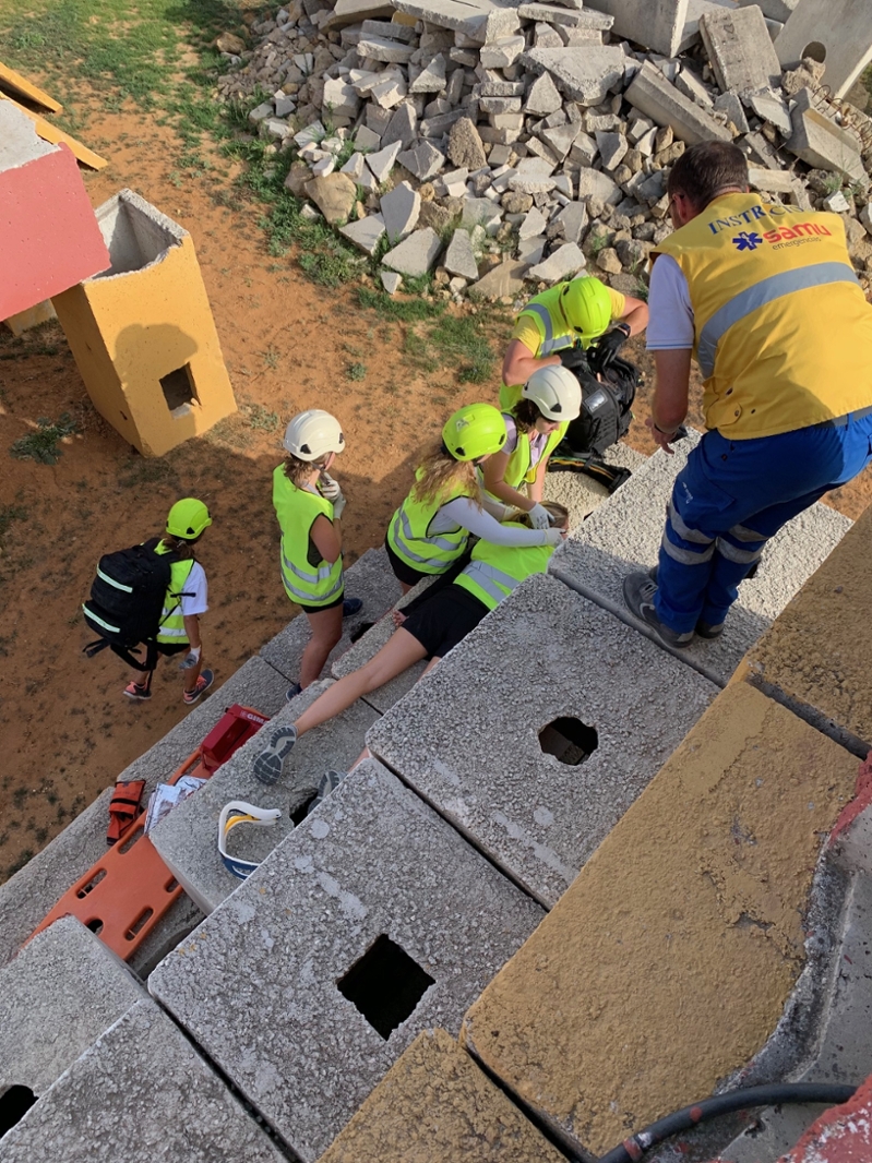Students working in an emergency situation.