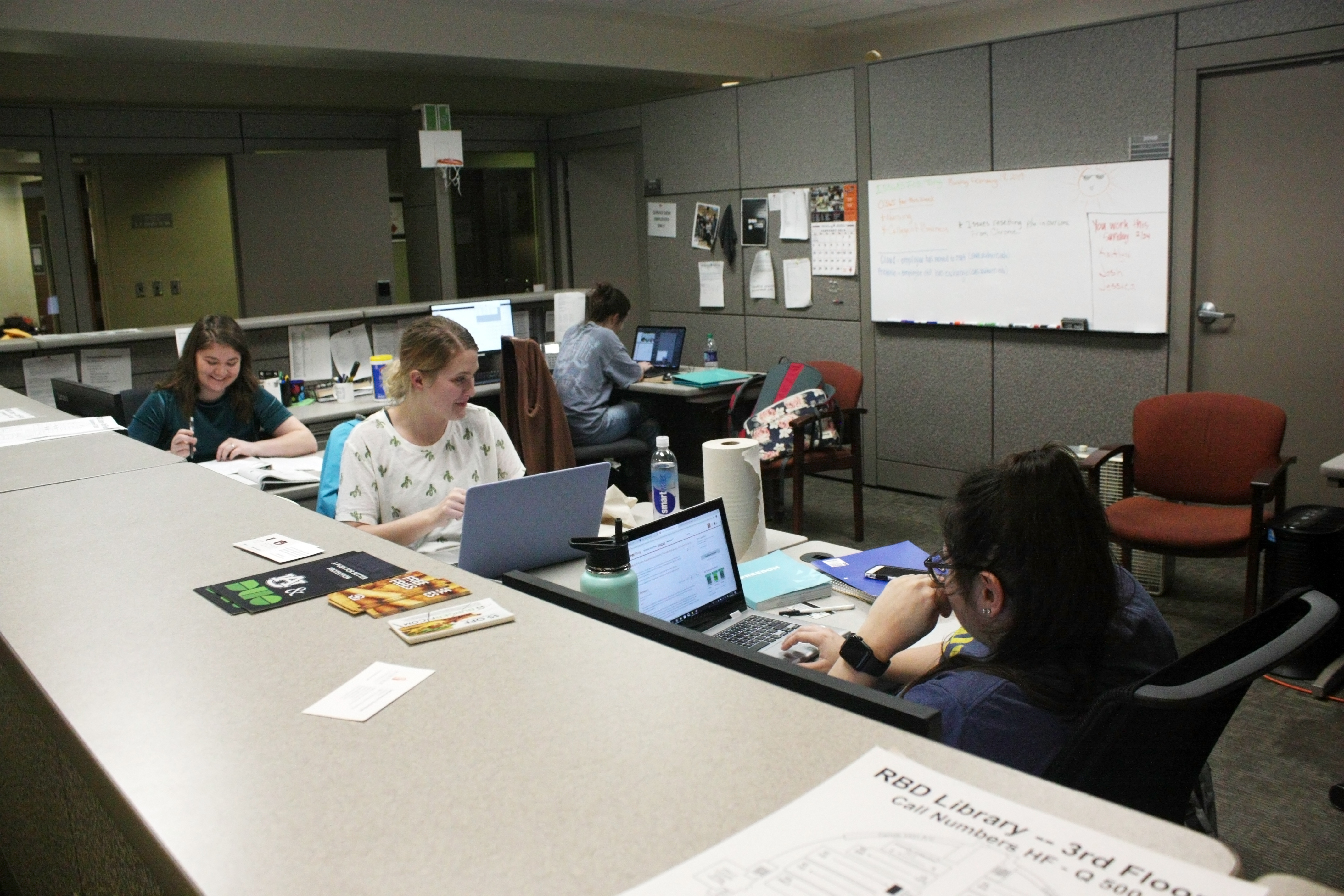 Students working at the IT Service Desk