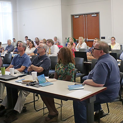 OIT Staff Watching Leadercast Presentations