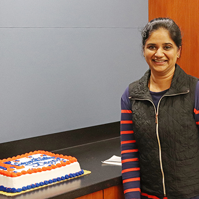 Deepa Devarakonda accepting her Spirit of Excellence Award