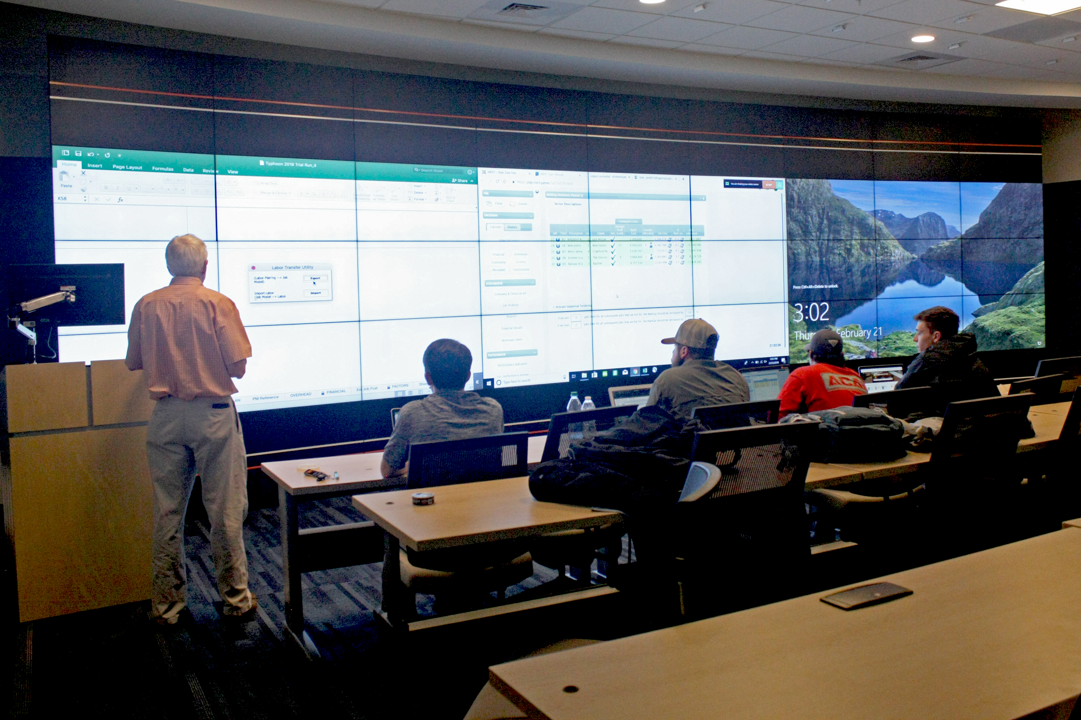 Students interacting with the Video Display Wall in the Gorrie Center
