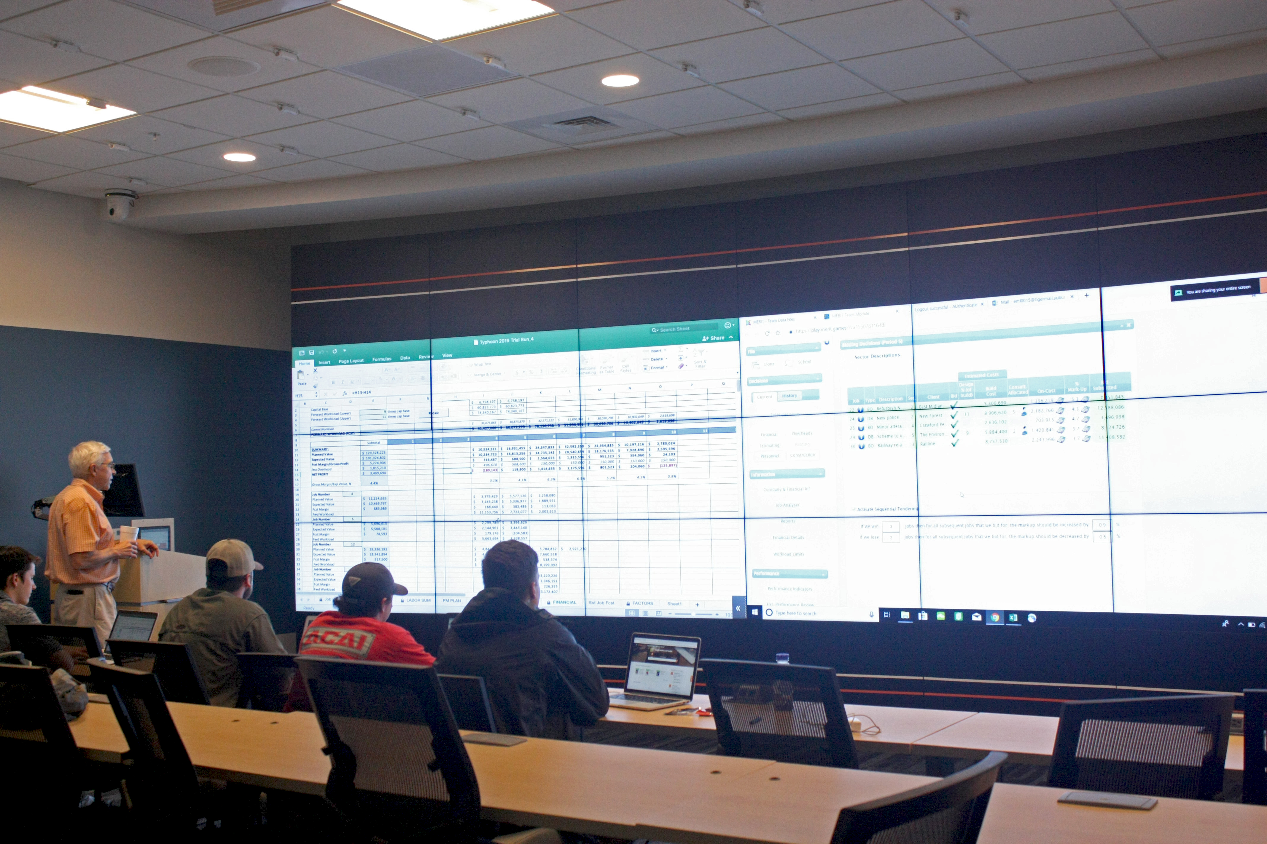 Students interacting with the Video Display Wall in the Gorrie Center