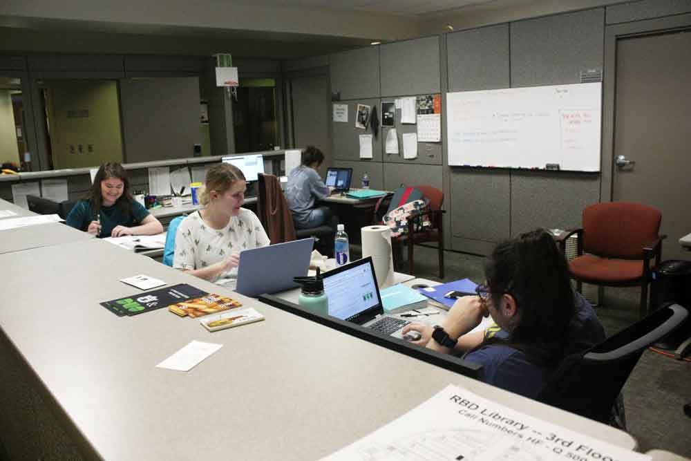 Students working at the IT Service Desk