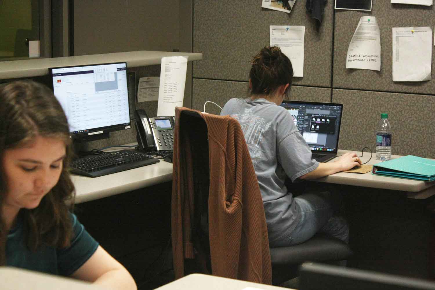 Students working at the IT Service Desk