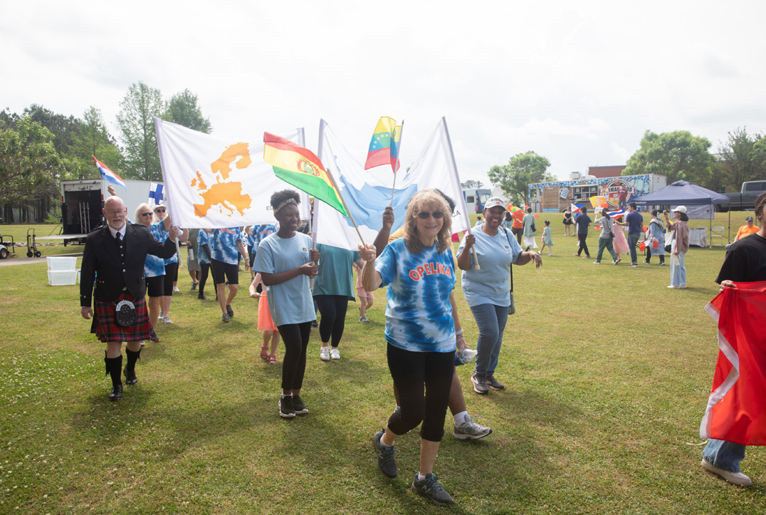 Global Community Day members with Europe flag