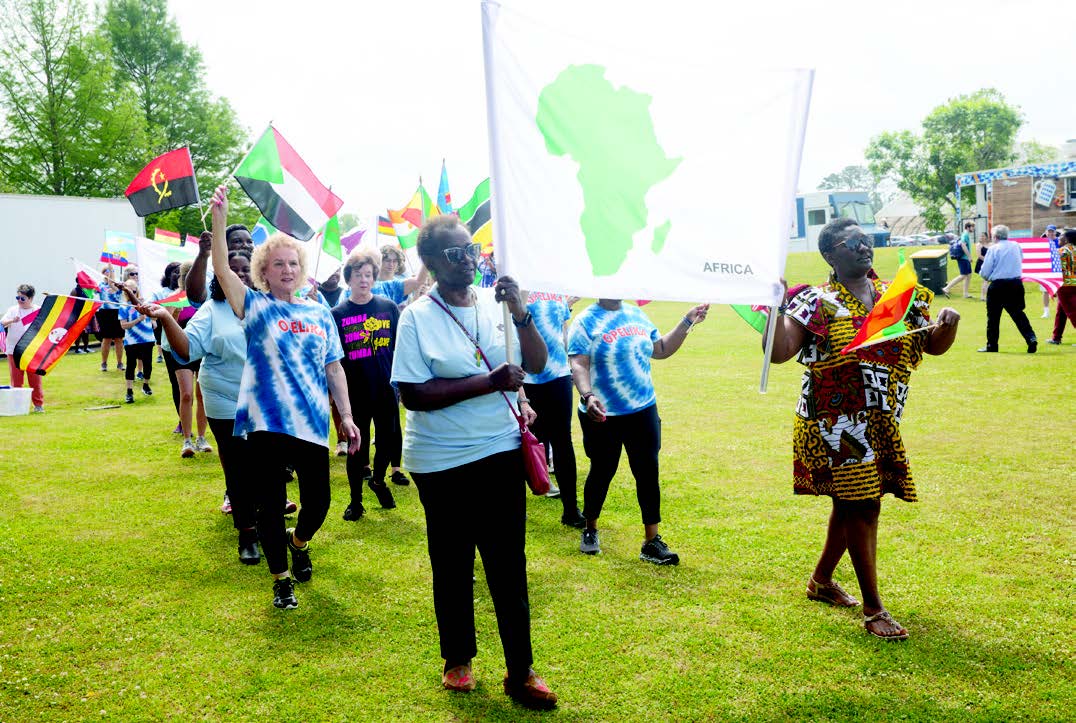 Global Community Day members with Africa flag