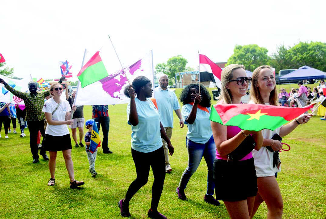 Global Community Day members with North America flag