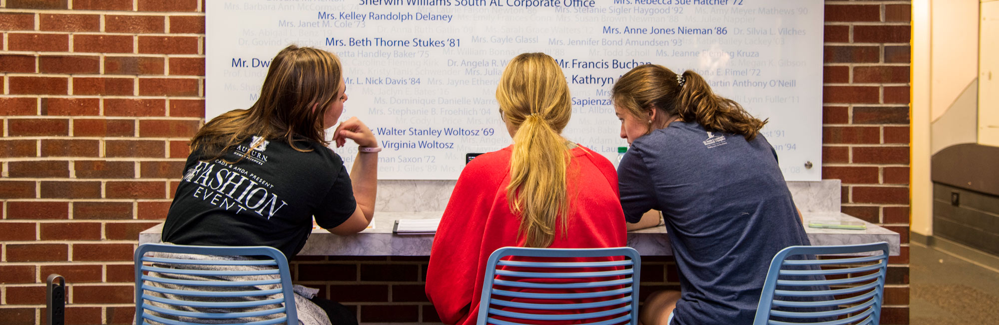 Students sitting in one of the study spaces in Spidle Hall.