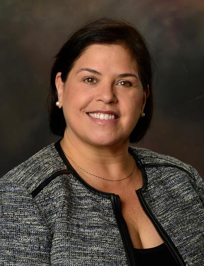 ANA C. PLANA, head shot