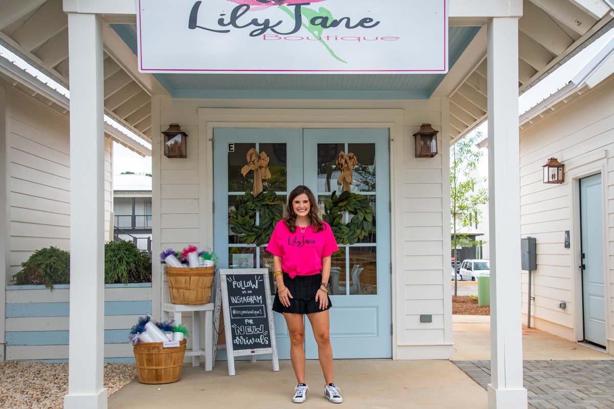 Sarah Jane Levine standing out front of here boutique.