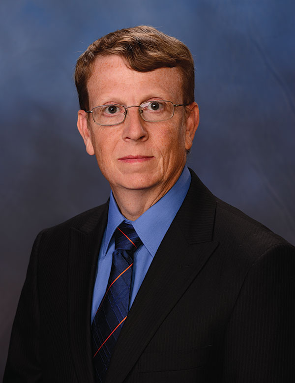 Portrait image of Geoffrey E. Hill