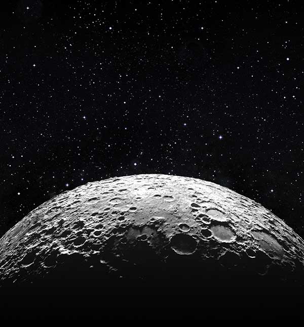 The moon pictured in a star-filled sky