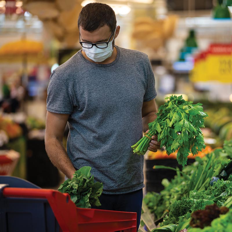 a man shops in a grocery store