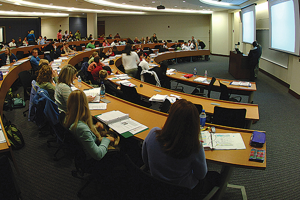 students sittng in a large classroom