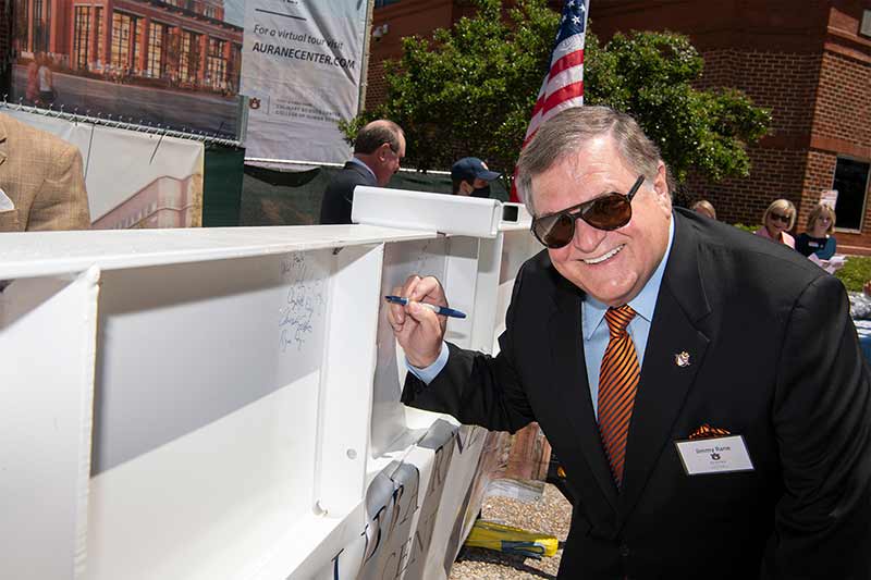 Jimmy Rane signs the final construction beam
