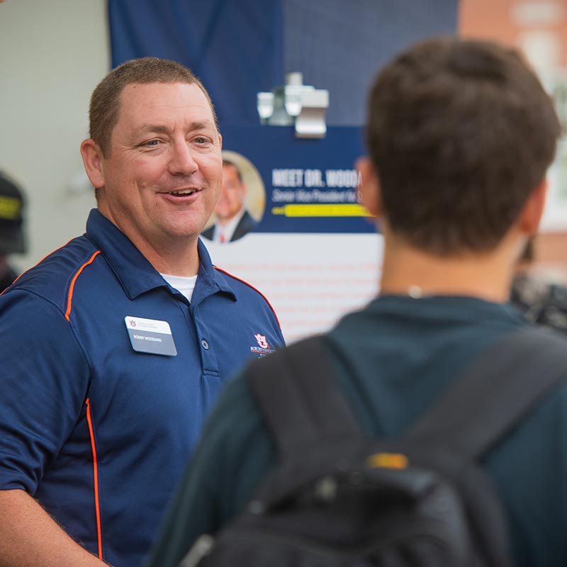 Bobby Woodard talks with students
