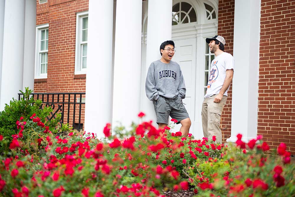 Students outside of a dorm